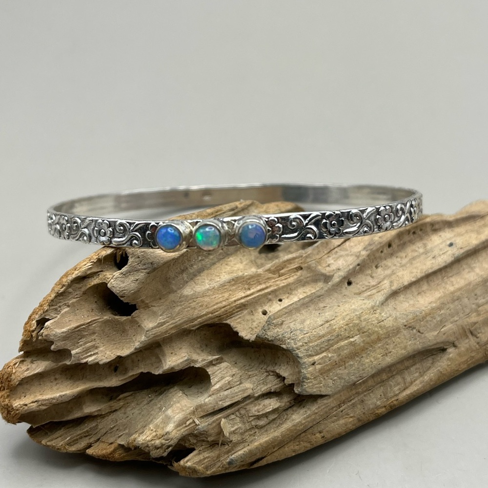 Elegant Sterling Silver Bracelet with Blue Opal Gemstone Accents